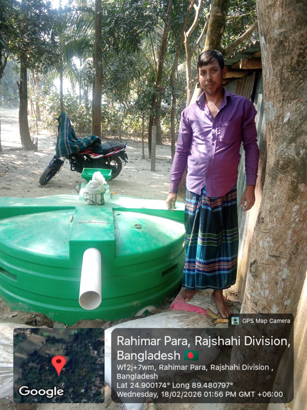 Biodigester installation beside rural home